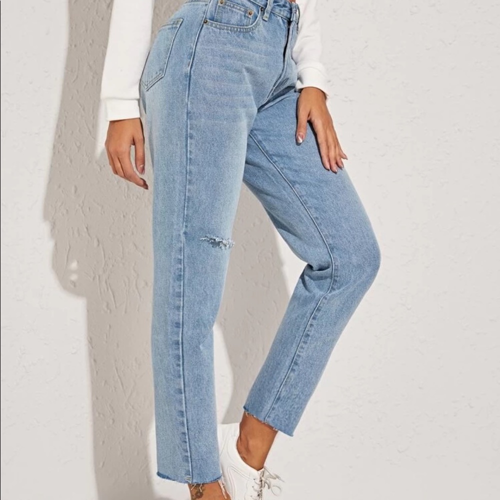 White wash Jean with rip in one knee